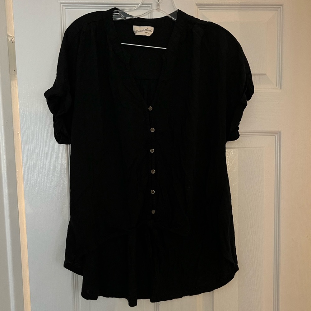 Shirt sleeve button front shirt with tie bottom